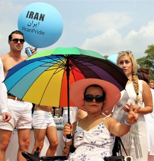 Iranian disabled model in Iran Boat in Amsterdam Canal Pride 2018 Photo: Parisa Akbarzadeh - (CC) JoopeA